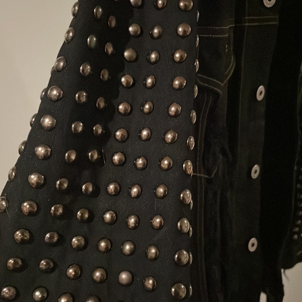 Amazing studded jean jacket.  Too unique for words.